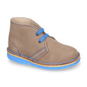 Suede safari boots with contrast stitching, laces and Outsole.