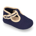 Classic cotton canvas T-Strap shoes for babies with hook and loop strap.