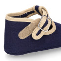 Classic cotton canvas T-Strap shoes for babies with hook and loop strap.