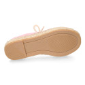 Laces up espadrille shoes in washed cotton canvas.