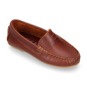 Classic tanned leather kids loafer shoes with detail mask.