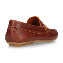 Classic tanned leather kids loafer shoes with detail mask.