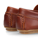 Classic tanned leather kids loafer shoes with detail mask.