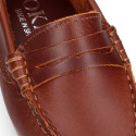 Classic tanned leather kids loafer shoes with detail mask.