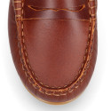 Classic tanned leather kids loafer shoes with detail mask.