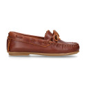 Classic tanned leather kids loafer shoes with laces design.