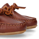 Classic tanned leather kids loafer shoes with laces design.