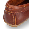 Classic tanned leather kids loafer shoes with laces design.