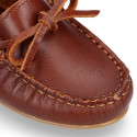 Classic tanned leather kids loafer shoes with laces design.