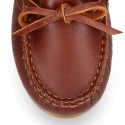 Classic tanned leather kids loafer shoes with laces design.