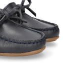 Classic navy blue leather kids loafer shoes with laces design.