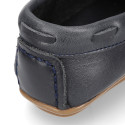 Classic navy blue leather kids loafer shoes with laces design.