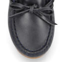 Classic navy blue leather kids loafer shoes with laces design.