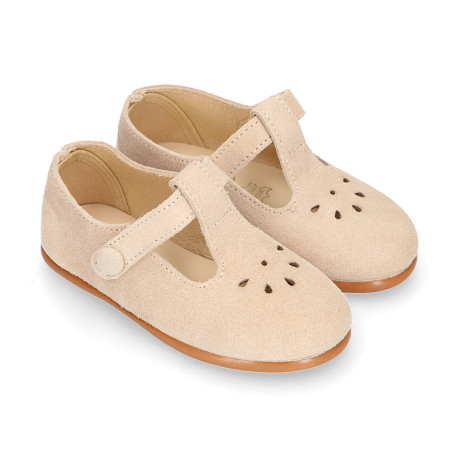 Suede leather Kids T-Strap shoes with hook and loop strap closure and chopped design in ivory color.