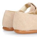 Suede leather Kids T-Strap shoes with hook and loop strap closure and chopped design in ivory color.