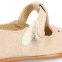 Suede leather Kids T-Strap shoes with hook and loop strap closure and chopped design in ivory color.