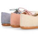 English style kids shoes with shoelaces in suede leather in pastel colors.