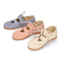 English style kids shoes with shoelaces in suede leather in pastel colors.