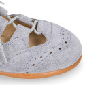 English style kids shoes with shoelaces in suede leather in pastel colors.