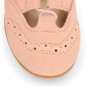 English style kids shoes with shoelaces in suede leather in pastel colors.