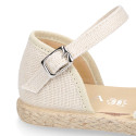 Linen canvas girl espadrille shoes for ceremony with lace and flower design.