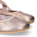 Bailarina niña tipo Ballet con cintas cruzadas elásticas en piel bronce.