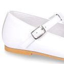 Little Girl T-Strap OKAA Mary Jane shoes in white patent leather.