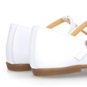 Girl T-BAR Mary Jane shoes in White soft Nappa leather with petals design.