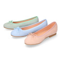 Soft suede leather classic girl ballet flats with adjustable ribbon in pastel colors.