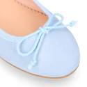 Soft suede leather classic girl ballet flats with adjustable ribbon in pastel colors.