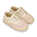 Linen canvas combined with suede leather Oxford style espadrille shoes in natural color.