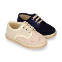 Linen canvas combined with suede leather Oxford style espadrille shoes in natural color.