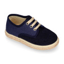 Linen canvas combined with suede leather Oxford style espadrille shoes in natural color.