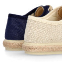 Linen canvas combined with suede leather Oxford style espadrille shoes in natural color.