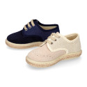 Linen canvas combined with suede leather Oxford style espadrille shoes in natural color.
