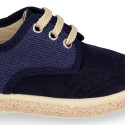 Linen canvas combined with suede leather Oxford style espadrille shoes in natural color.