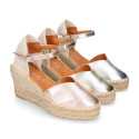 Woman wedge espadrilles shoes with Tulip shape in laminated leather.