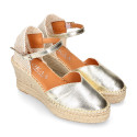 Woman wedge espadrilles shoes with Tulip shape in laminated leather.