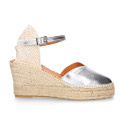 Woman wedge espadrilles shoes with Tulip shape in laminated leather.