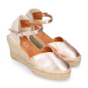 Woman wedge espadrilles shoes with Tulip shape in laminated leather.