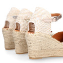 Woman wedge espadrilles shoes with Tulip shape in laminated leather.