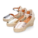 Woman wedge espadrilles shoes with Tulip shape in laminated leather.