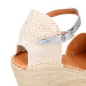 Woman wedge espadrilles shoes with Tulip shape in laminated leather.