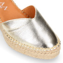 Woman wedge espadrilles shoes with Tulip shape in laminated leather.