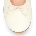 Soft Nappa leather classic girl ballet flats with adjustable ribbon in Ivory color.