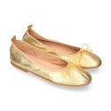 Soft Nappa leather classic girl ballet flats with adjustable ribbon in Gold color.