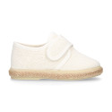 White linen canvas oxford shoe espadrille style with hook and loop closure.