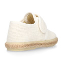 White linen canvas oxford shoe espadrille style with hook and loop closure.