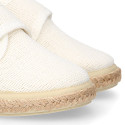 White linen canvas oxford shoe espadrille style with hook and loop closure.