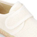 White linen canvas oxford shoe espadrille style with hook and loop closure.